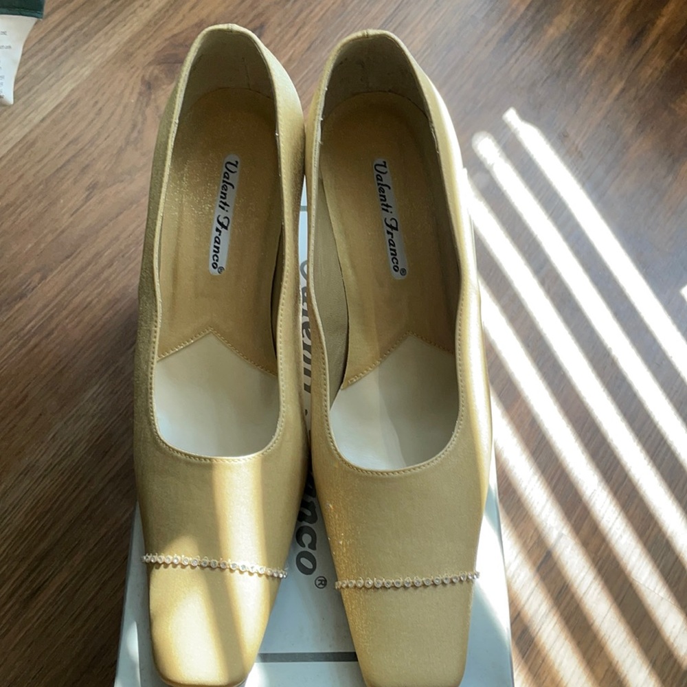 Gold satin shoes for formal occasion